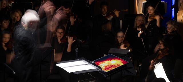 NASA image: National Philharmonic Performs Cosmic Cycles: A Space Symphony