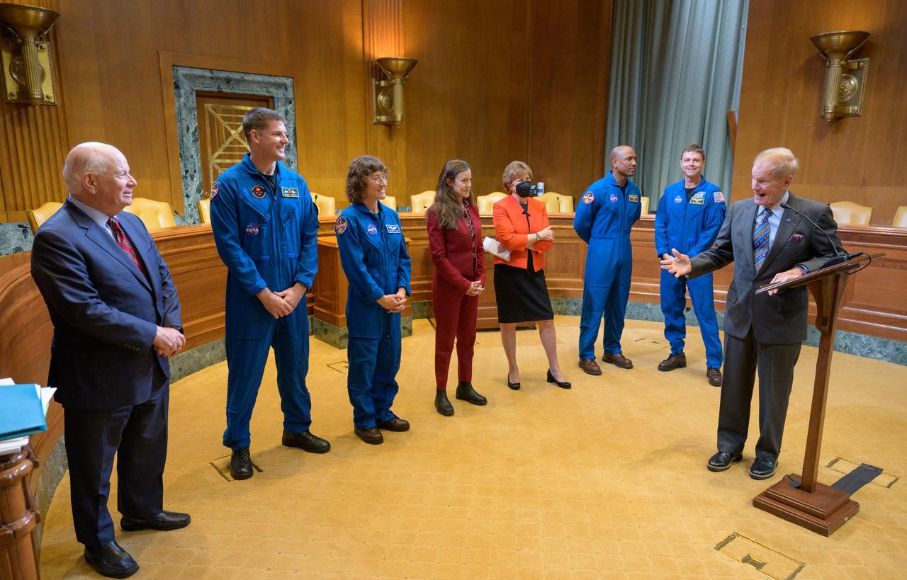 NASA Administrator Bill Nelson gives remarks as Senator Ben Cardin, D-MD., left,   CSA (Canadian Space Agency) astronaut Jeremy Hansen, NASA astronaut Christina Hammock Koch, CSA (Canadian Space Agency) President Lisa Campbell, Sen. Jeanne Shaheen, D-N.H., NASA astronauts Victor Glover, and Reid Wiseman, look on during a meet and greet, Wednesday, May 17, 2023, at the Dirksen Senate Office Building in Washington. Wiseman, Glover, Hammock Koch, and Hansen, who will fly around the Moon on NASA’s Artemis II flight test, visited Washington to discuss their upcoming mission with members of Congress and others. Photo Credit: (NASA/Bill Ingalls)