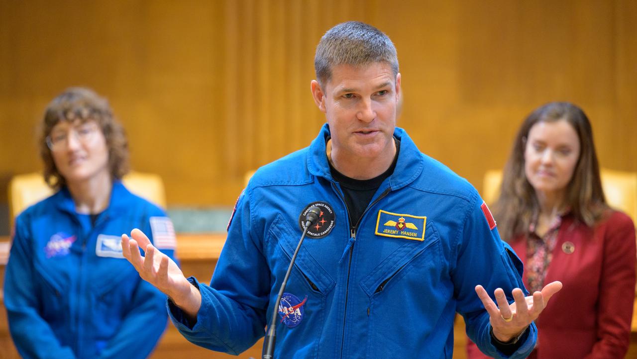 CSA (Canadian Space Agency) astronaut Jeremy Hansen gives remarks as NASA Astronaut Christina Hammock Koch, left, and CSA (Canadian Space Agency) President Lisa Campbell look on, during a meet and greet, Wednesday, May 17, 2023, at the Dirksen Senate Office Building in Washington. Hansen, Hammock Koch, and NASA astronauts Reid Wiseman and Victor Glover, who will fly around the Moon on NASA’s Artemis II flight test, visited Washington to discuss their upcoming mission with members of Congress and others. Photo Credit: (NASA/Bill Ingalls)