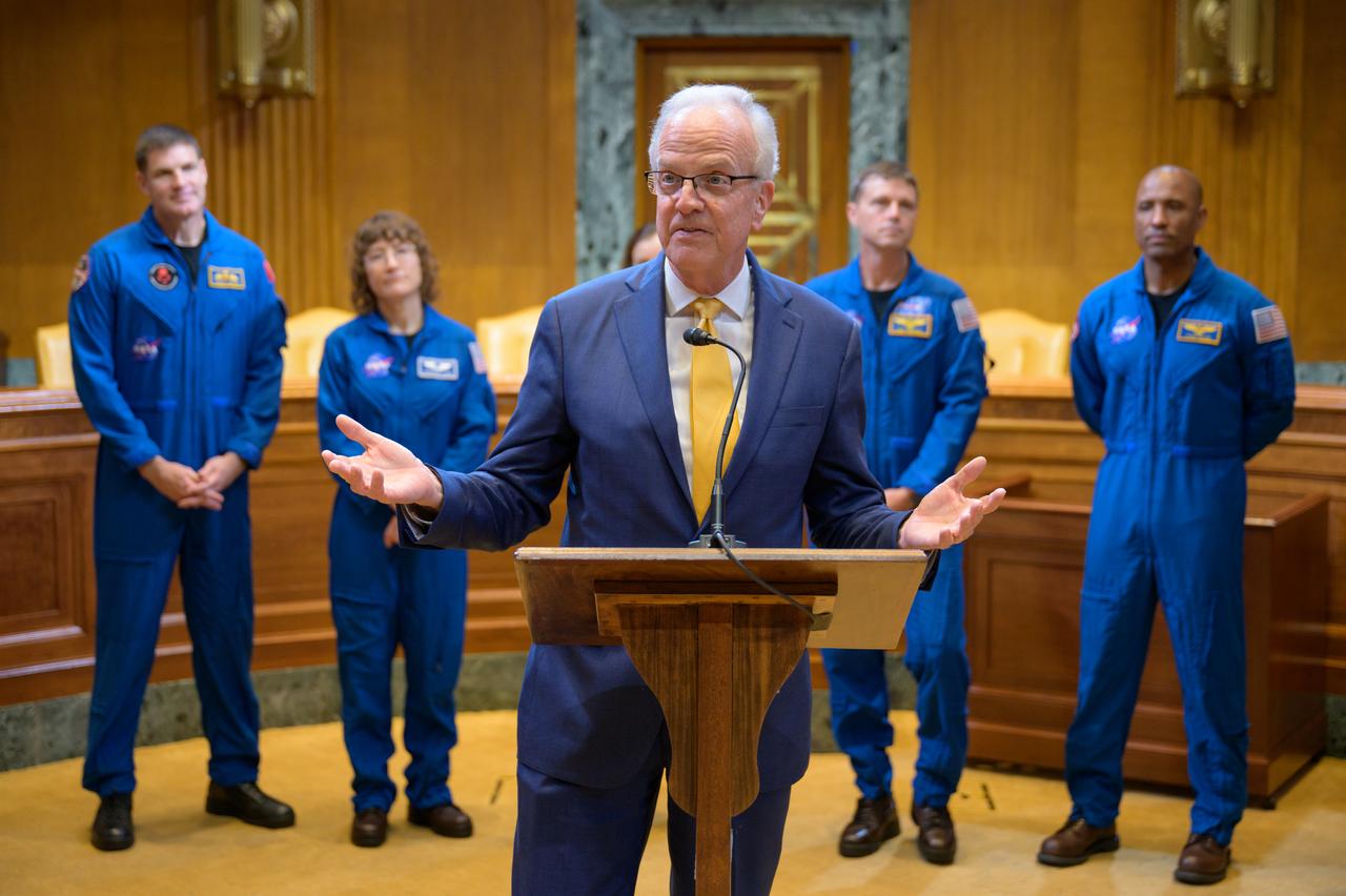 Sen. Jerry Moran, R-KS., gives remarks as CSA (Canadian Space Agency) astronaut Jeremy Hansen, left, NASA astronauts Christina Hammock Koch, Reid Wiseman, and Victor Glover, look on during a meet and greet, Wednesday, May 17, 2023, at the Dirksen Senate Office Building in Washington. Wiseman, Glover, Hammock Koch, and Hansen, who will fly around the Moon on NASA’s Artemis II flight test, visited Washington to discuss their upcoming mission with members of Congress and others. Photo Credit: (NASA/Bill Ingalls)
