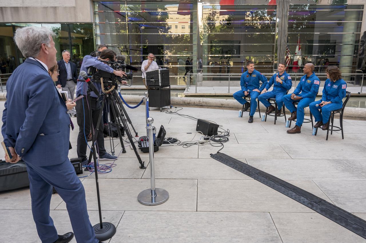 From left to right, CSA (Canadian Space Agency) astronaut Jeremy Hansen, NASA astronauts Reid Wiseman, Victor Glover, and Christina Hammock Koch participate in a media gather, Wednesday, May 17, 2023, outside of the Canadian Embassy in Washington. Wiseman, Glover, Koch, and Hansen, who will fly around the Moon on NASA’s Artemis II flight test, visited Washington to discuss their upcoming mission with members of Congress and others. Photo Credit: (NASA/Keegan Barber)