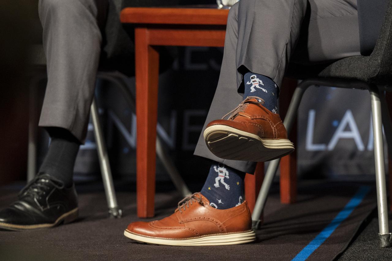The astronaut themed socks of NASA Associate Administrator Bob Cabana are seen during a Moon to Mars Town Hall, Thursday, May 18, 2023, at the Mary W. Jackson NASA Headquarters building in Washington. Photo Credit: (NASA/Keegan Barber)