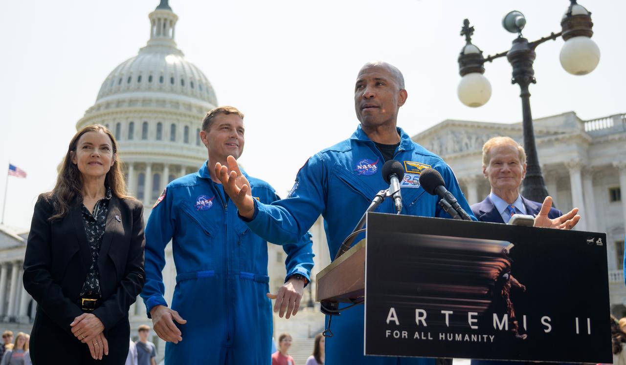 NASA astronaut Victor Glover speaks during a media gather, as CSA (Canadian Space Agency) President Lisa Campbell, left, NASA astronaut Reid Wiseman, and NASA Administrator Bill Nelson, right, look on, Thursday, May 18, 2023, on Capitol Hill grounds in Washington. NASA astronauts Reid Wiseman, Victor Glover, Christina Hammock Koch, and CSA (Canadian Space Agency) astronaut Jeremy Hansen, who will fly around the Moon on NASA’s Artemis II flight test, visited Washington to discuss their upcoming mission with members of Congress and others. Photo Credit: (NASA/Bill Ingalls)