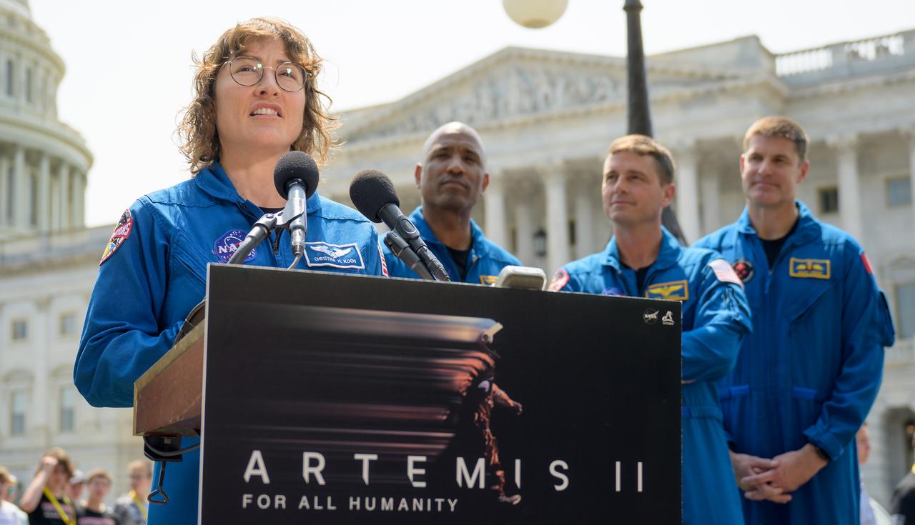 NASA Astronaut Christina Hammock Koch speaks during a media gather as NASA astronauts Victor Glover and Reid Wiseman and CSA (Canadian Space Agency) astronaut Jeremy Hansen look on, Thursday, May 18, 2023, on Capitol Hill grounds in Washington. Wiseman, Glover, Hammock Koch, and Hansen, who will fly around the Moon on NASA’s Artemis II flight test, visited Washington to discuss their upcoming mission with members of Congress and others. Photo Credit: (NASA/Bill Ingalls)