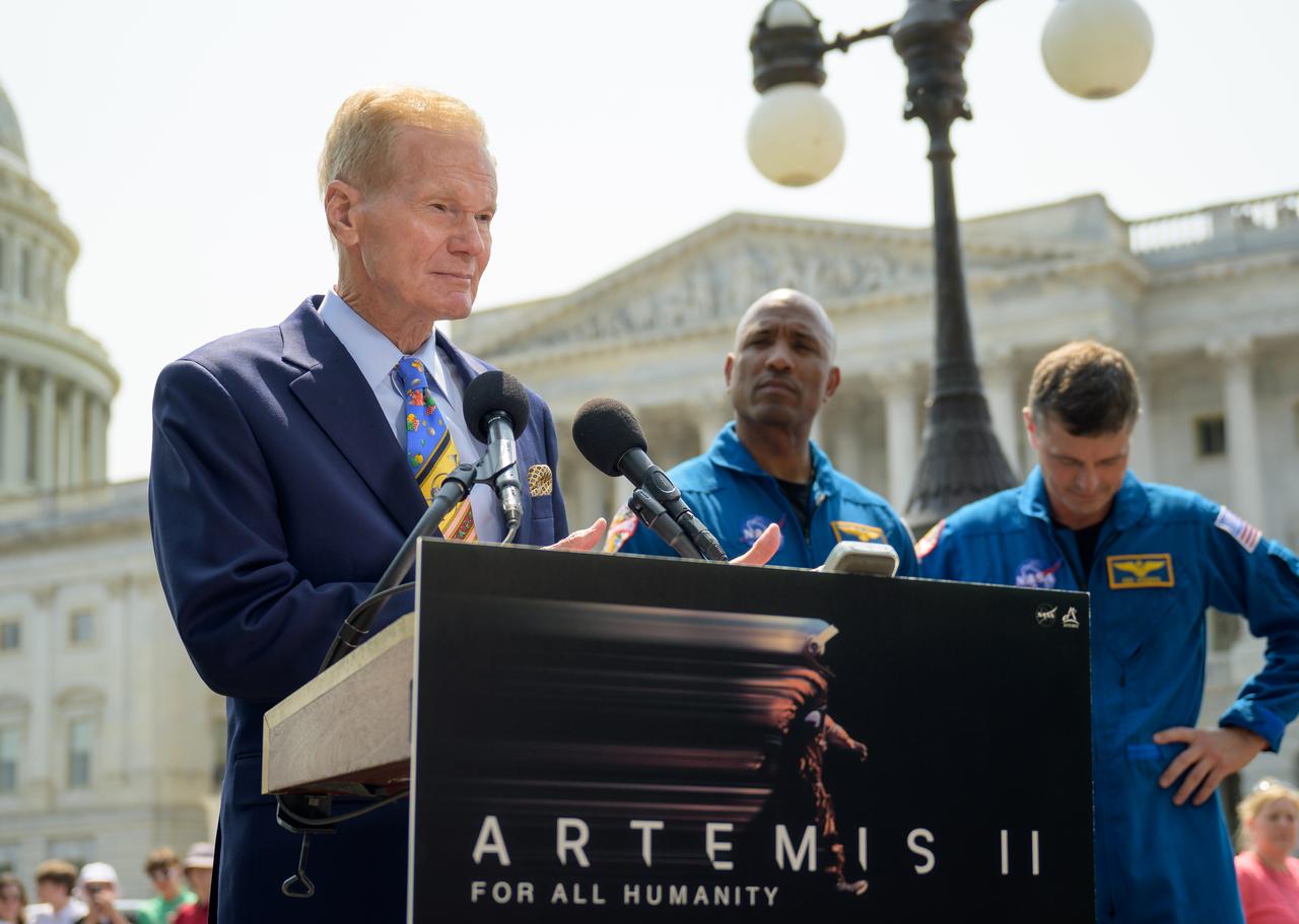 NASA Administrator Bill Nelson gives remarks as NASA astronauts Victor Glover and Reid Wiseman look on, during a media gather, Thursday, May 18, 2023, on Capitol Hill grounds in Washington. NASA astronauts Reid Wiseman, Victor Glover, Christina Hammock Koch, and CSA (Canadian Space Agency) astronaut Jeremy Hansen, who will fly around the Moon on NASA’s Artemis II flight test, visited Washington to discuss their upcoming mission with members of Congress and others. Photo Credit: (NASA/Bill Ingalls)