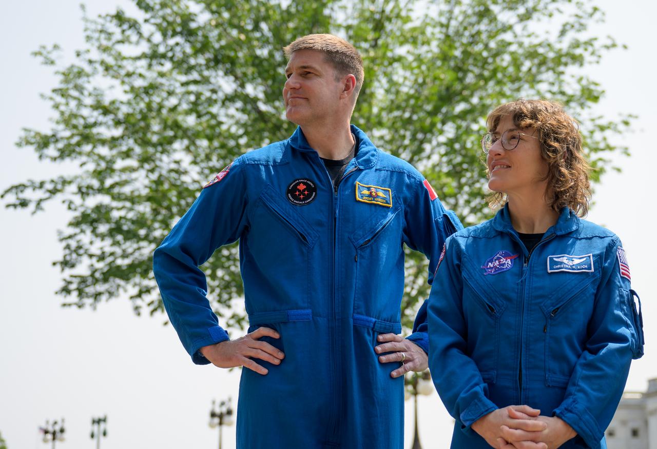 CSA (Canadian Space Agency) astronaut Jeremy Hansen, left, and NASA Astronaut Christina Hammock Koch are seen during a media gather, Thursday, May 18, 2023, on Capitol Hill grounds in Washington. NASA astronauts Reid Wiseman, Victor Glover, Christina Hammock Koch, and CSA (Canadian Space Agency) astronaut Jeremy Hansen, who will fly around the Moon on NASA’s Artemis II flight test, visited Washington to discuss their upcoming mission with members of Congress and others. Photo Credit: (NASA/Bill Ingalls)