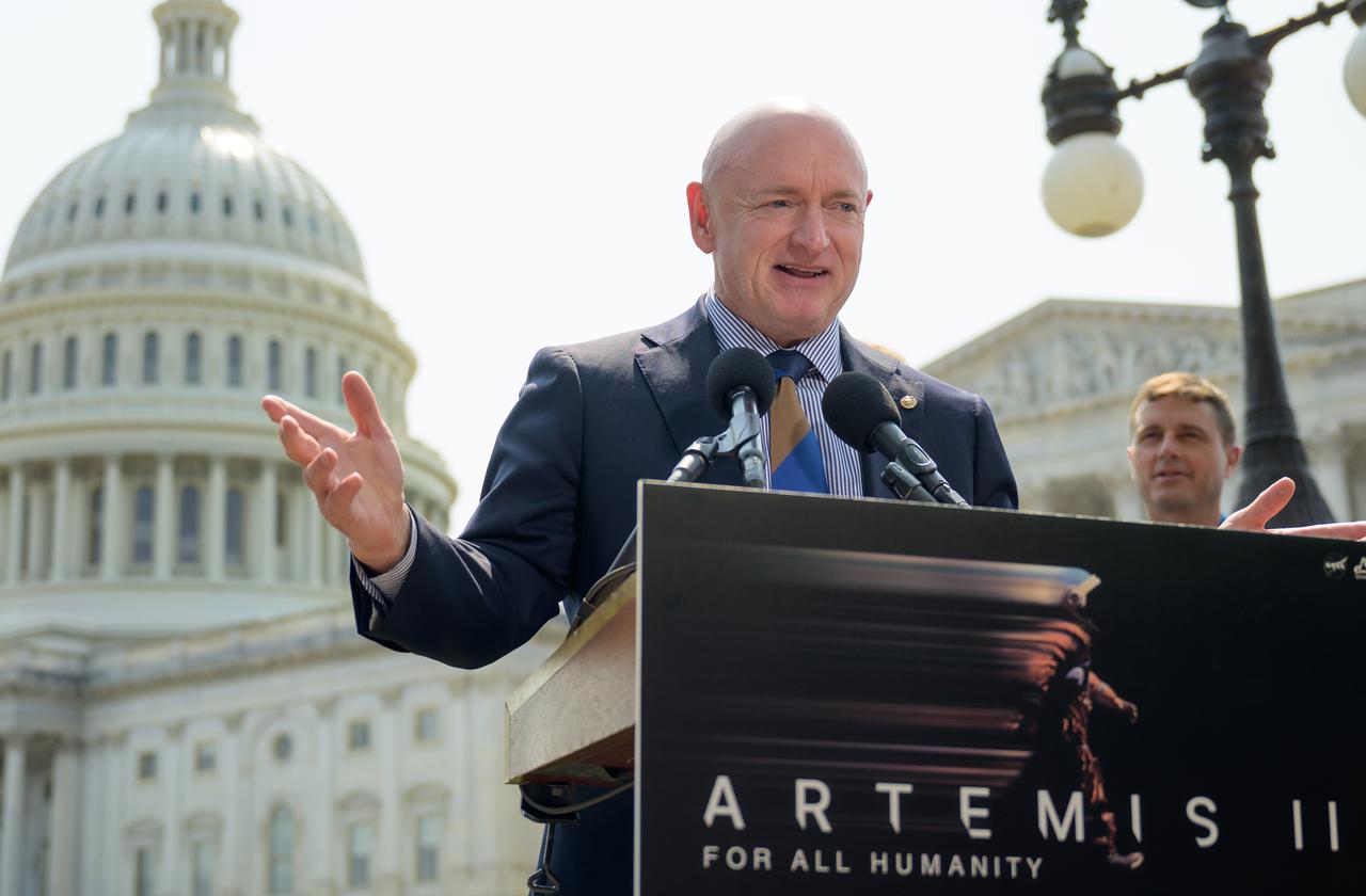 Sen. Mark Kelly, D-Ariz., gives remarks during a media gather, Thursday, May 18, 2023, on Capitol Hill grounds in Washington. NASA astronauts Reid Wiseman, Victor Glover, Christina Hammock Koch, and CSA (Canadian Space Agency) astronaut Jeremy Hansen, who will fly around the Moon on NASA’s Artemis II flight test, visited Washington to discuss their upcoming mission with members of Congress and others. Photo Credit: (NASA/Bill Ingalls)