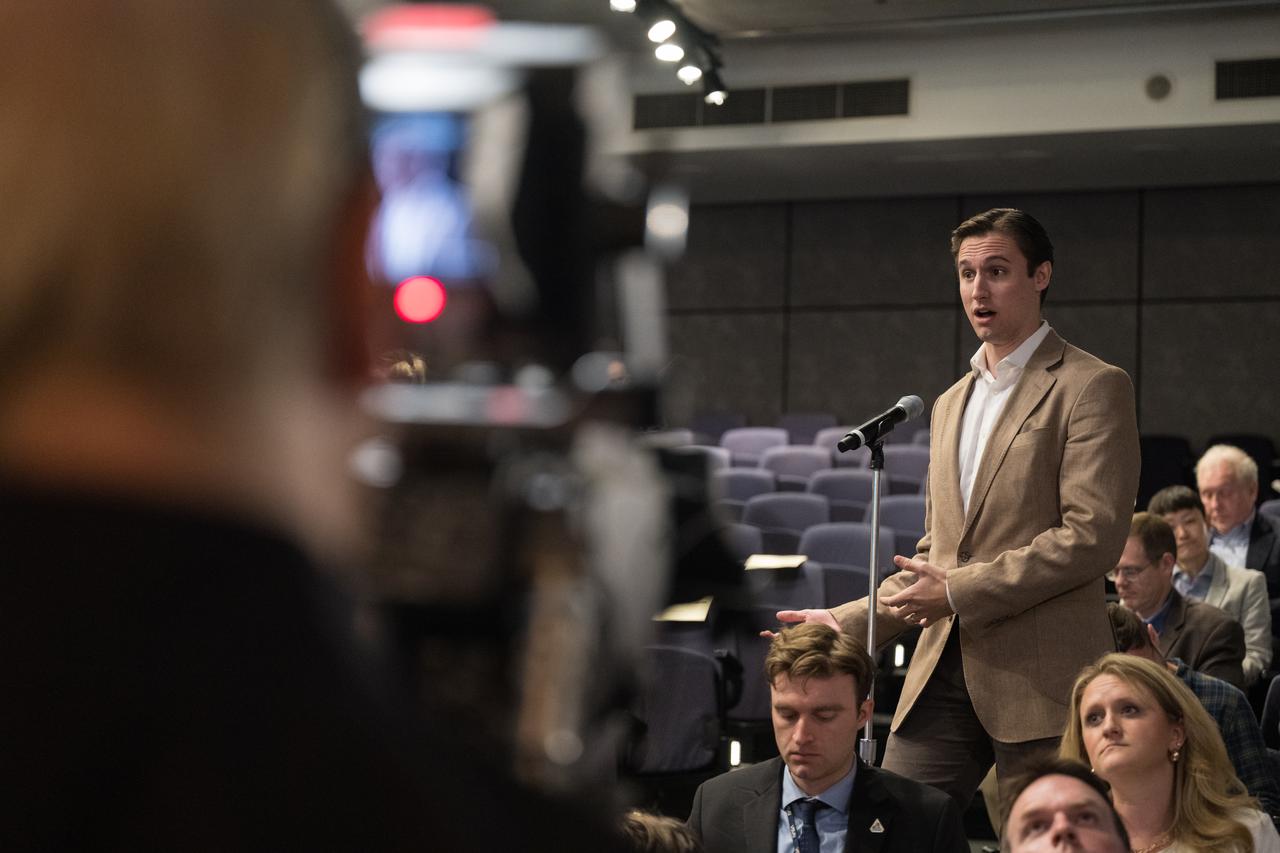 A member of the news media asks a question during an event announcing Blue Origin as the company selected to develop a sustainable human landing system for the Artemis V Moon mission, Friday, May 19, 2023 at the Mary W. Jackson NASA Headquarters building in Washington. The human landing system will take astronauts to and from Gateway in lunar orbit to the surface and back to the lunar space station as part of NASA’s return to the Moon for science, exploration, and inspiration. Photo Credit: (NASA/Aubrey Gemignani)