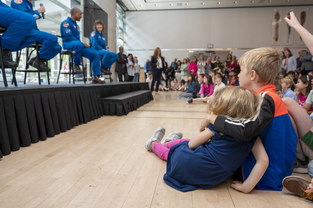 Children of embassy staff are seen during an embassy workforce event with CSA (Canadian Space Agency) astronaut Jeremy Hansen, NASA astronauts Reid Wiseman, Victor Glover, and Christina Hammock Koch, Friday, May 19, 2023, at the Canadian Embassy in Washington. Wiseman, Glover, Koch, and Hansen, who will fly around the Moon on NASA’s Artemis II flight test, visited Washington to discuss their upcoming mission with members of Congress and others. Photo Credit: (NASA/Keegan Barber)