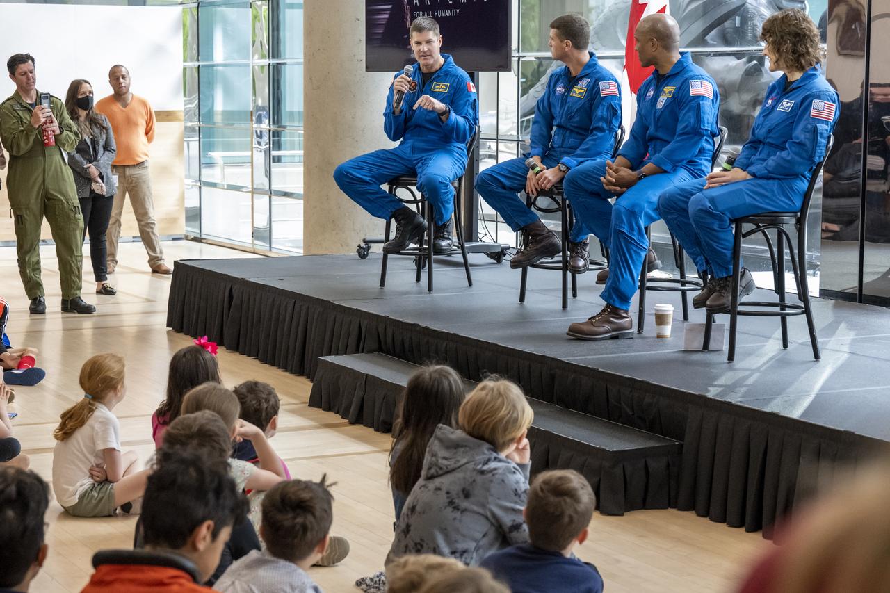From left to right, CSA (Canadian Space Agency) astronaut Jeremy Hansen, NASA astronauts Reid Wiseman, Victor Glover, and Christina Hammock Koch participate in an embassy workforce event, Friday, May 19, 2023, at the Canadian Embassy in Washington. Wiseman, Glover, Koch, and Hansen, who will fly around the Moon on NASA’s Artemis II flight test, visited Washington to discuss their upcoming mission with members of Congress and others. Photo Credit: (NASA/Keegan Barber)