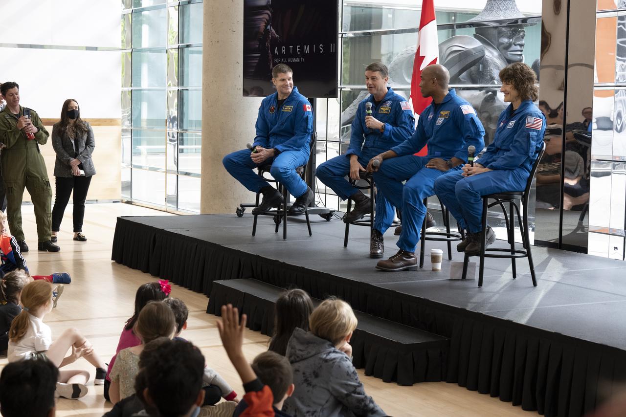 From left to right, CSA (Canadian Space Agency) astronaut Jeremy Hansen, NASA astronauts Reid Wiseman, Victor Glover, and Christina Hammock Koch participate in an embassy workforce event, Friday, May 19, 2023, at the Canadian Embassy in Washington. Wiseman, Glover, Koch, and Hansen, who will fly around the Moon on NASA’s Artemis II flight test, visited Washington to discuss their upcoming mission with members of Congress and others. Photo Credit: (NASA/Keegan Barber)
