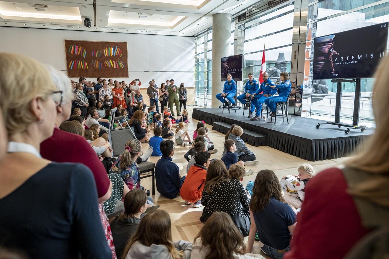 From left to right, CSA (Canadian Space Agency) astronaut Jeremy Hansen, NASA astronauts Reid Wiseman, Victor Glover, and Christina Hammock Koch participate in an embassy workforce event, Friday, May 19, 2023, at the Canadian Embassy in Washington. Wiseman, Glover, Koch, and Hansen, who will fly around the Moon on NASA’s Artemis II flight test, visited Washington to discuss their upcoming mission with members of Congress and others. Photo Credit: (NASA/Keegan Barber)