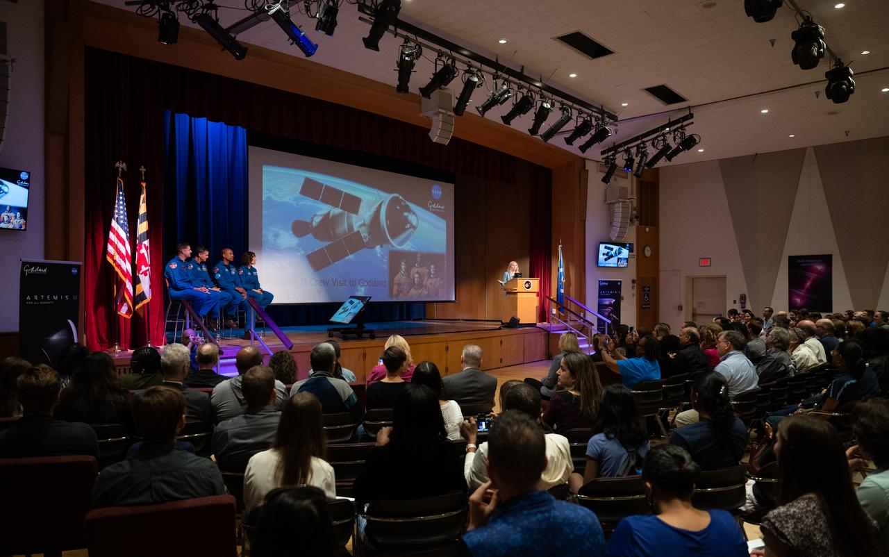 CSA (Canadian Space Agency) astronaut Jeremy Hansen, left, and NASA astronauts Reid Wiseman, Victor Glover, and Christina Hammock Koch, are seen as they are introduced by Dr. Christa Peters-Lidard, director of the Sciences and Exploration Directorate at NASA's Goddard Space Flight Center, right, during an employee engagement event, Friday, May 19, 2023, during an employee engagement event at NASA’s Goddard Space Flight Center in Greenbelt, Md. Wiseman, Glover, Hammock Koch, and Hansen, who will fly around the Moon on NASA’s Artemis II flight test, visited Washington to discuss their upcoming mission with members of Congress and others. Photo Credit: (NASA/Joel Kowsky)
