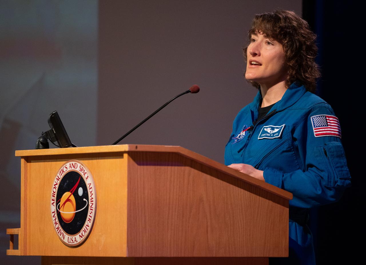 NASA Astronaut Christina Hammock Koch speaks during an employee engagement event with fellow Artemis II crewmates CSA (Canadian Space Agency) astronaut Jeremy Hansen, and NASA astronauts Reid Wiseman and Victor Glover, Friday, May 19, 2023, at NASA’s Goddard Space Flight Center in Greenbelt, Md. Wiseman, Glover, Hammock Koch, and Hansen, who will fly around the Moon on NASA’s Artemis II flight test, visited Washington to discuss their upcoming mission with members of Congress and others. Photo Credit: (NASA/Joel Kowsky)