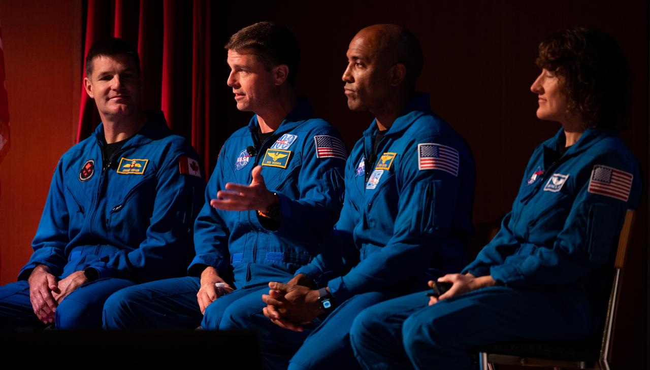 NASA astronaut Reid Wiseman, second from left, answers a question alongside CSA (Canadian Space Agency) astronaut Jeremy Hansen, left, and NASA astronauts Victor Glover second from right, and Christina Hammock Koch right, during an employee engagement event, Friday, May 19, 2023, at NASA’s Goddard Space Flight Center in Greenbelt, Md. Wiseman, Glover, Hammock Koch, and Hansen, who will fly around the Moon on NASA’s Artemis II flight test, visited Washington to discuss their upcoming mission with members of Congress and others. Photo Credit: (NASA/Joel Kowsky)