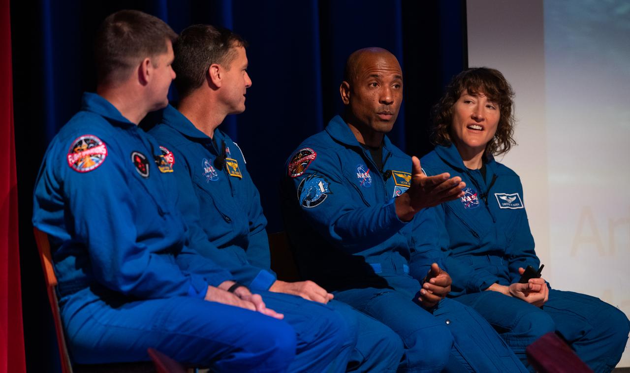 NASA astronaut Victor Glover, second from right, answers a question alongside CSA (Canadian Space Agency) astronaut Jeremy Hansen, left, and NASA astronauts Reid Wiseman second from left, and Christina Hammock Koch, right, during an employee engagement event, Friday, May 19, 2023, at NASA’s Goddard Space Flight Center in Greenbelt, Md. Wiseman, Glover, Hammock Koch, and Hansen, who will fly around the Moon on NASA’s Artemis II flight test, visited Washington to discuss their upcoming mission with members of Congress and others. Photo Credit: (NASA/Joel Kowsky)