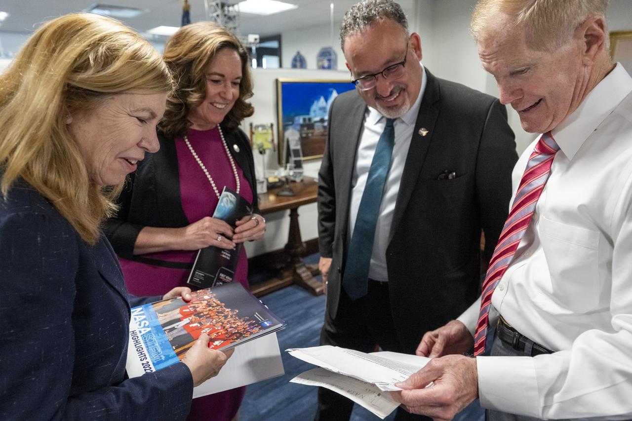 From left to right, Department of Education Chief of Staff Sheila Nix, Deputy Secretary of Education Cindy Marten, Secretary of Education Miguel Cardona, and NASA Administrator Bill Nelson read letters from students prior to a memorandum of understanding (MOU) signing ceremony, Wednesday, May 24, 2023, at the Mary W. Jackson NASA Headquarters building in Washington.  The NASA and Department of Education MOU is focused on strengthening the collaboration between the two agencies, including efforts that advance STEM education across the nation. Photo Credit: (NASA/Keegan Barber)