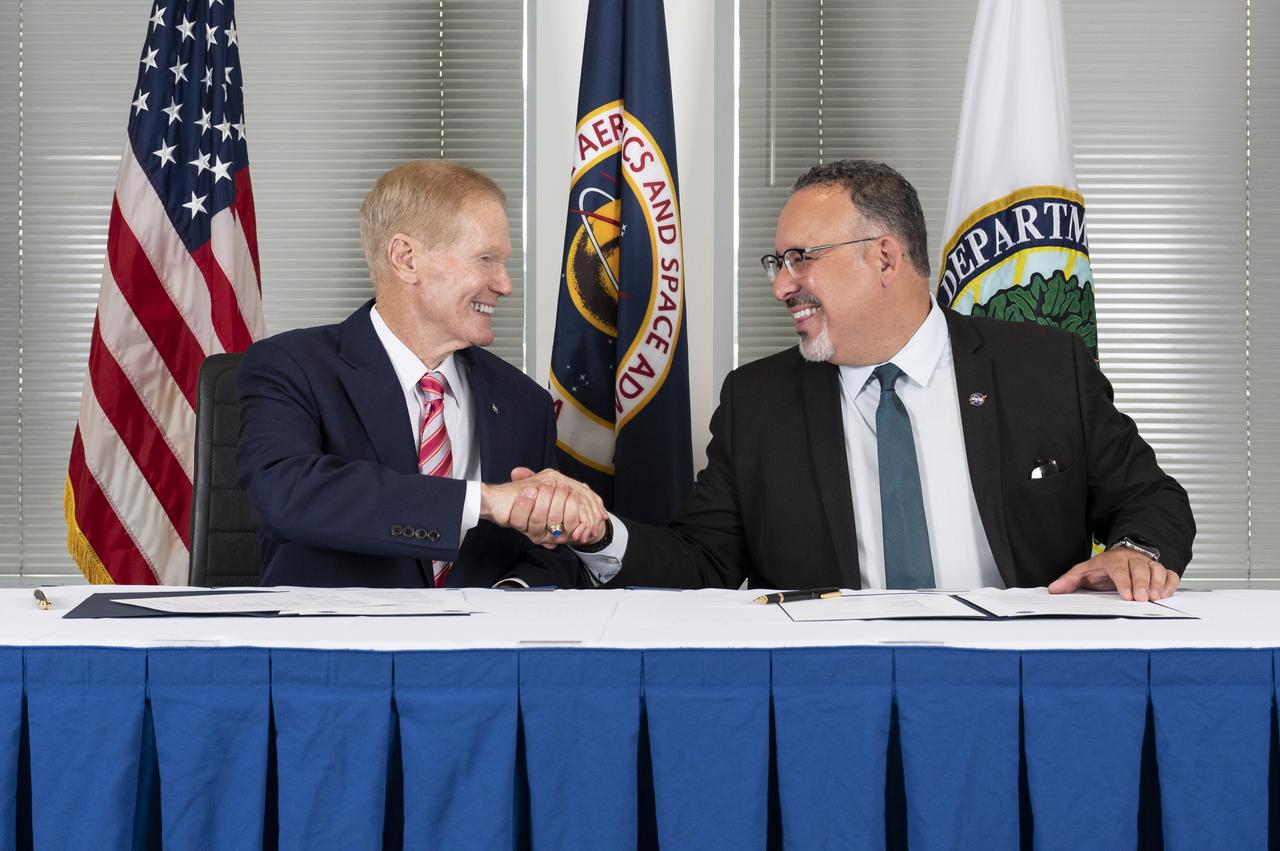 NASA Administrator Bill Nelson and Secretary of Education Miguel Cardona participate in a memorandum of understanding (MOU) signing ceremony, Wednesday, May 24, 2023, at the Mary W. Jackson NASA Headquarters building in Washington.  The NASA and Department of Education MOU is focused on strengthening the collaboration between the two agencies, including efforts that advance STEM education across the nation. Photo Credit: (NASA/Keegan Barber)
