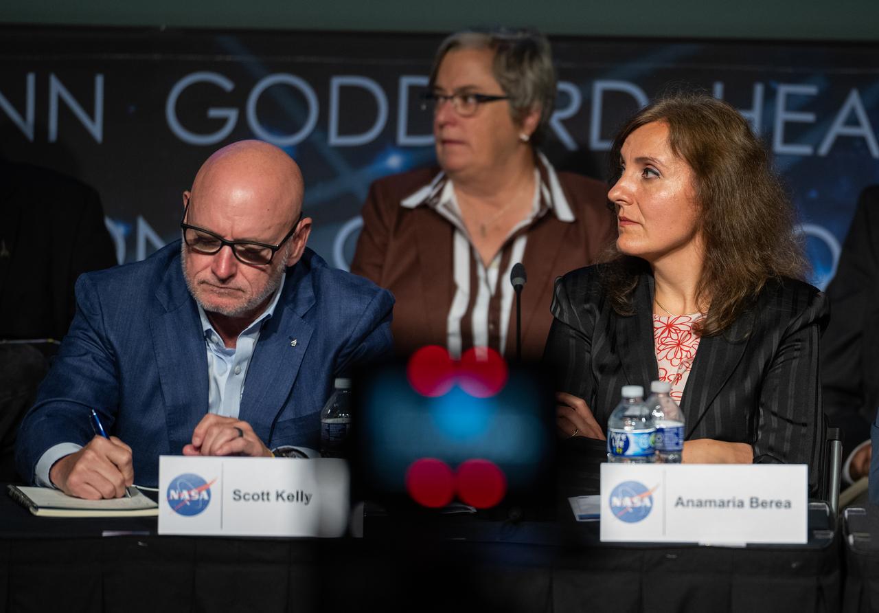 Scott Kelly, former NASA astronaut, left, and Anamaria Berea, associate professor of Computational and Data Science at George Mason University, are seen during a public meeting of NASA’s unidentified anomalous phenomena (UAP) independent study team, Wednesday, May 31, 2023 at the Mary W. Jackson NASA Headquarters building in Washington. The UAP independent study team is a counsel of 16 community experts across diverse areas on matters relevant to potential methods of study for unidentified anomalous phenomena. NASA commissioned the nine-month study to examine UAP from a scientific perspective and create a roadmap for how to use data and the tools of science to move our understanding of UAP forward. Photo Credit: (NASA/Joel Kowsky)