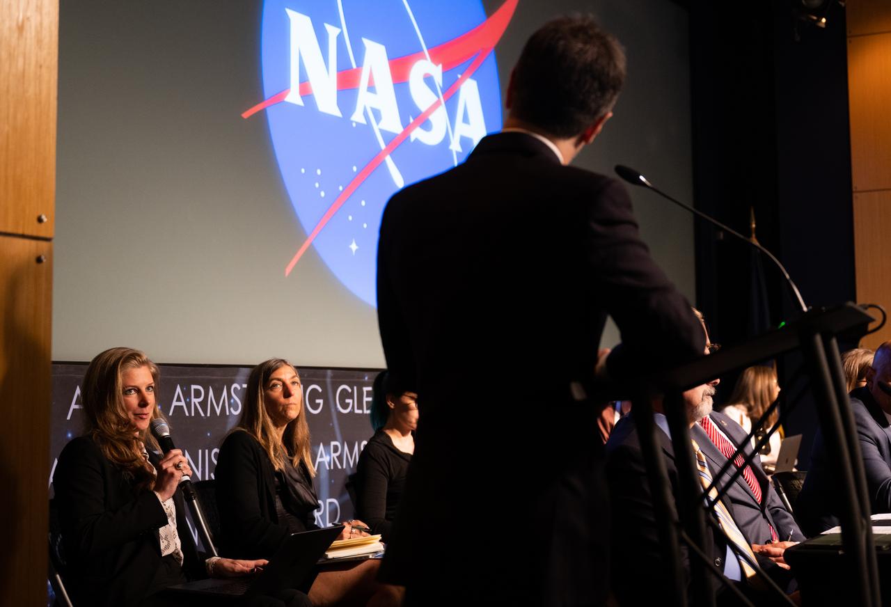 Nadia Drake, science journalist, left, asks a question of Dr. Sean Kirkpatrick, director of All-domain Anomaly Resolution Office at the Department of Defense, during a public meeting of NASA’s unidentified anomalous phenomena (UAP) independent study team, Wednesday, May 31, 2023 at the Mary W. Jackson NASA Headquarters building in Washington. The UAP independent study team is a counsel of 16 community experts across diverse areas on matters relevant to potential methods of study for unidentified anomalous phenomena. NASA commissioned the nine-month study to examine UAP from a scientific perspective and create a roadmap for how to use data and the tools of science to move our understanding of UAP forward. Photo Credit: (NASA/Joel Kowsky)