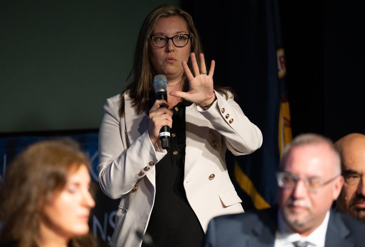 Jennifer Buss, CEO of the Potomac Institute of Policy Studies, asks a question during a public meeting of NASA’s unidentified anomalous phenomena (UAP) independent study team, Wednesday, May 31, 2023 at the Mary W. Jackson NASA Headquarters building in Washington. The UAP independent study team is a counsel of 16 community experts across diverse areas on matters relevant to potential methods of study for unidentified anomalous phenomena. NASA commissioned the nine-month study to examine UAP from a scientific perspective and create a roadmap for how to use data and the tools of science to move our understanding of UAP forward. Photo Credit: (NASA/Joel Kowsky)