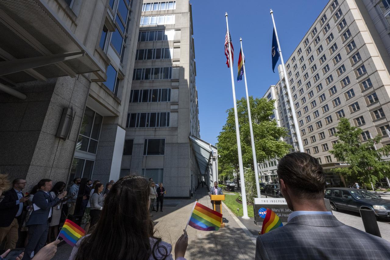 NASA Public Affairs Specialist Tyrone McCoy delivers remarks during a flag raising ceremony in recognition and celebration of LGBTQI+ Pride Month, Thursday, June 1, 2023, at the Mary W. Jackson NASA Headquarters building in Washington. Photo Credit: (NASA/Keegan Barber)