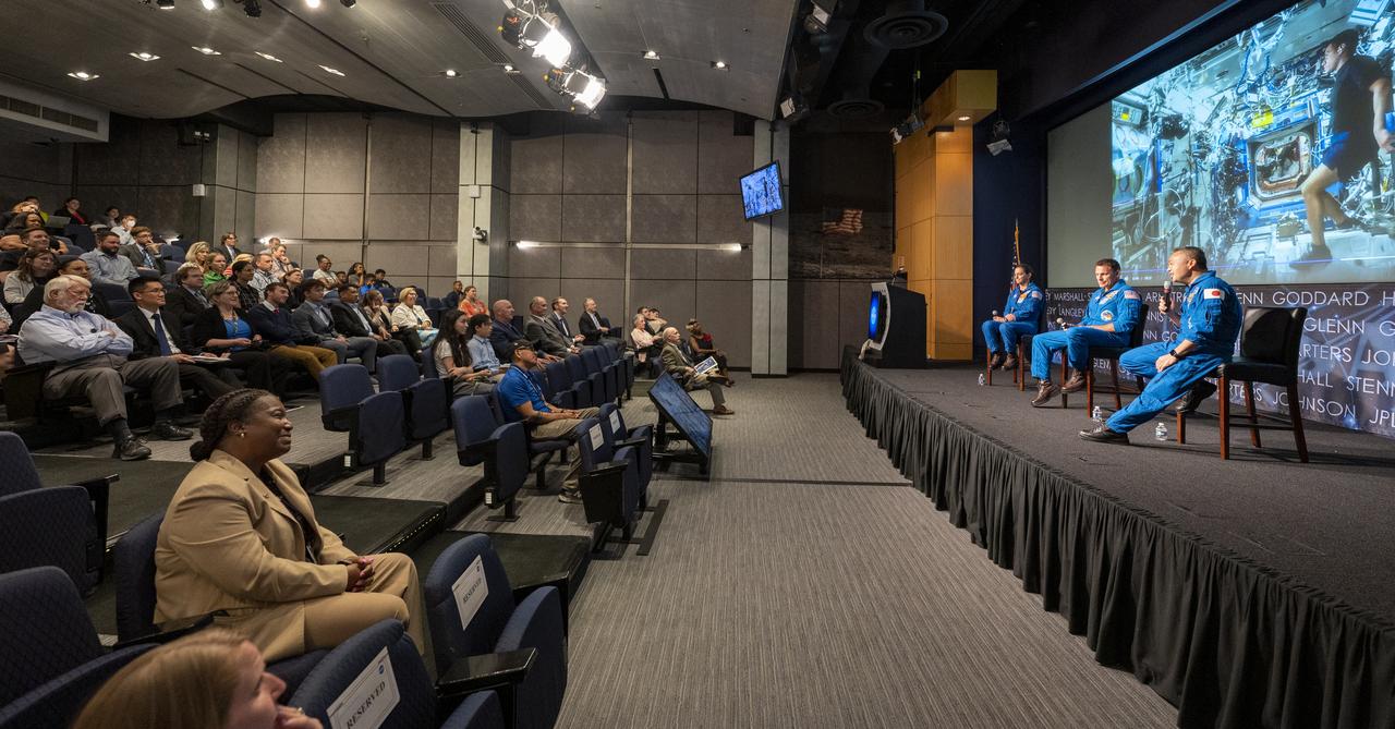 NASA astronauts Nicole Mann, left, Josh Cassada, center, and Japan Aerospace Exploration Agency (JAXA) astronaut Koichi Wakata, right, speak about their time onboard the International Space Station during an employee engagement event Monday, June 5, 2023, at the Mary W. Jackson NASA Headquarters building in Washington.  Mann, Cassada, and Wakata spent 157 days in space as part of Expedition 68 aboard the International Space Station. Photo Credit: (NASA/Keegan Barber)