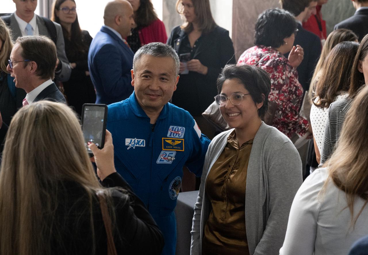 NASA’s SpaceX Crew-5 astronaut Koichi Wakata of the Japan Aerospace Exploration Agency (JAXA) takes a picture with an attendee during NASA’s Science Day on the Hill event, Wednesday, June 7, 2023, at the Rayburn House Office Building in Washington. Photo Credit: (NASA/Joel Kowsky)