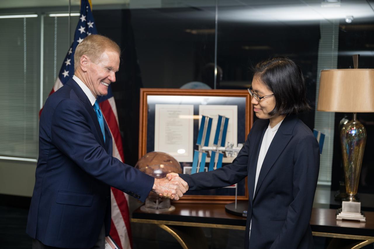 NASA Administrator Bill Nelson shakes hands with NASA General Counsel Iris Lan after she was ceremonially sworn in as the General Counsel, Tuesday, June 13, 2023, at the Mary W. Jackson NASA Headquarters building in Washington.  Photo Credit: (NASA/Aubrey Gemignani)