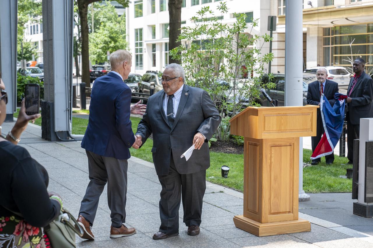 Associate Administrator for the Office of Small Business Programs Glenn Delgado greets NASA Administrator Bill Nelson during a flag raising ceremony in recognition and celebration of Juneteenth, Thursday, June 15, 2023, at the Mary W. Jackson NASA Headquarters building in Washington. Photo Credit: (NASA/Keegan Barber)