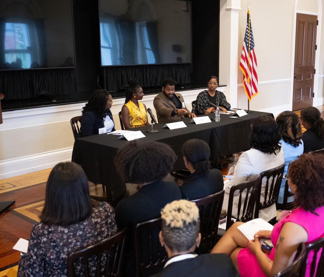 Amber McIntyre, Interagency and International Relations Advisor at NASA, left, moderates a panel discussion with Kim Macharia, Executive Director at Space Prize, second from left, Ronald Gamble, a theoretical astrophysicist at NASA’s Goddard Space Flight Center, second from right, and Zephanii Eisenstat, Space and Social Justice Advocate at the NAACP, right, during an Artemis Generation Roundtable for Black Space Week, Tuesday, June 20, 2023, at the Eisenhower Executive Office Building in Washington. As part of Black Space Week, the National Space Council and NASA collaborated with Black In Astro to host students for a discussion on the future of space exploration and equity. Photo Credit: (NASA/Joel Kowsky)