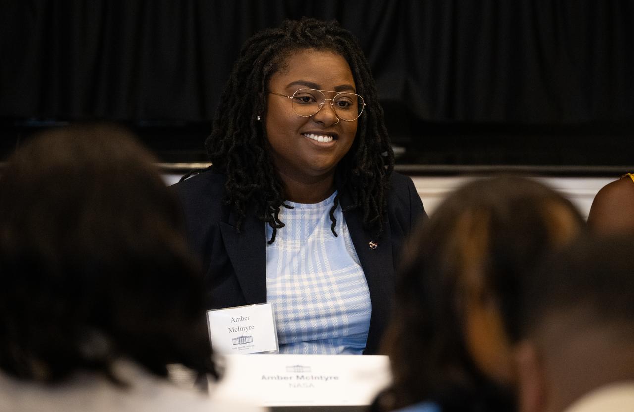 Amber McIntyre, Interagency and International Relations Advisor at NASA, is seen during a panel discussion with Kim Macharia, Executive Director at Space Prize, Ronald Gamble, a theoretical astrophysicist at NASA’s Goddard Space Flight Center, and Zephanii Eisenstat, Space and Social Justice Advocate at the NAACP, during an Artemis Generation Roundtable for Black Space Week, Tuesday, June 20, 2023, at the Eisenhower Executive Office Building in Washington. As part of Black Space Week, the National Space Council and NASA collaborated with Black In Astro to host students for a discussion on the future of space exploration and equity. Photo Credit: (NASA/Joel Kowsky)