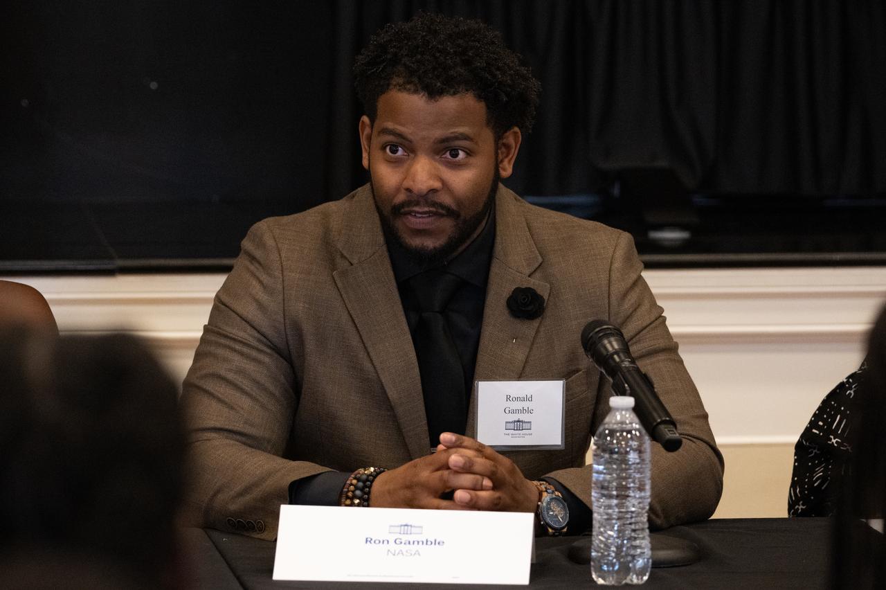 Ronald Gamble, a theoretical astrophysicist at NASA’s Goddard Space Flight Center, speaks during a panel discussion moderated by Amber McIntyre, Interagency and International Relations Advisor at NASA with Kim Macharia, Executive Director at Space Prize, and Zephanii Eisenstat, Space and Social Justice Advocate at the NAACP, during an Artemis Generation Roundtable for Black Space Week, Tuesday, June 20, 2023, at the Eisenhower Executive Office Building in Washington. As part of Black Space Week, the National Space Council and NASA collaborated with Black In Astro to host students for a discussion on the future of space exploration and equity. Photo Credit: (NASA/Joel Kowsky)