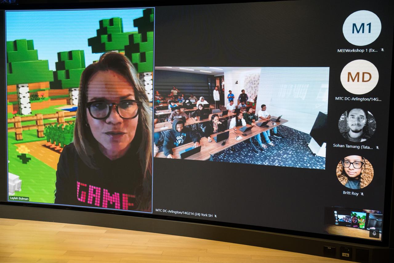 Microsoft Senior Program Manager and Executive Game Producer for Minecraft Education, Laylah Bulman, provides instruction to DC area students during Space Education Day, Tuesday, June 20, 2023, at the Microsoft Technology Center in Arlington, Va. Microsoft hosted the event to showcase the collaboration, early successes, and future plans for high quality student engagement through activities that combined space content and technologies like artificial intelligence and cloud computing. Photo Credit: (NASA/Aubrey Gemignani)