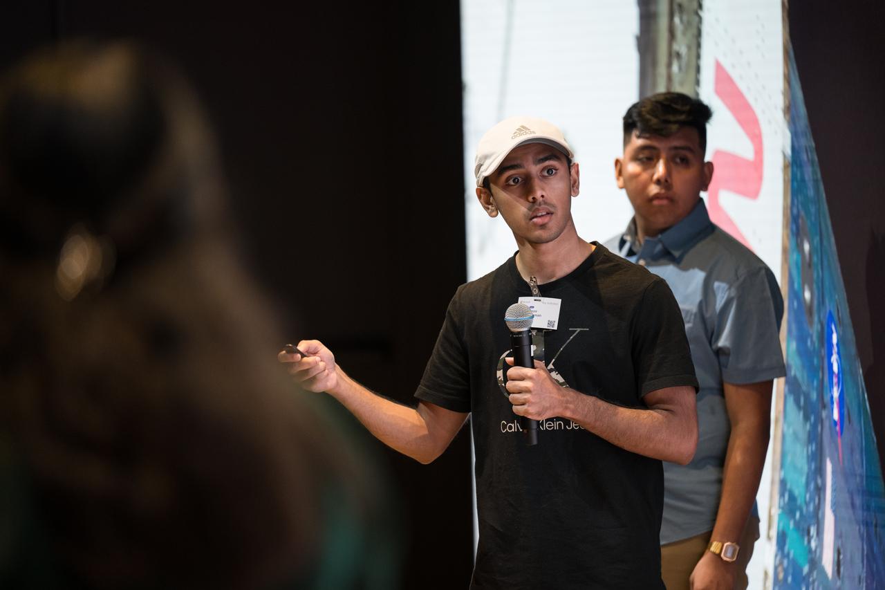 College students present their findings after a hackathon during Space Education Day, Tuesday, June 20, 2023, at the Microsoft Technology Center in Arlington, Va. Microsoft hosted the event to showcase the collaboration, early successes, and future plans for high quality student engagement through activities that combined space content and technologies like artificial intelligence and cloud computing. Photo Credit: (NASA/Aubrey Gemignani)