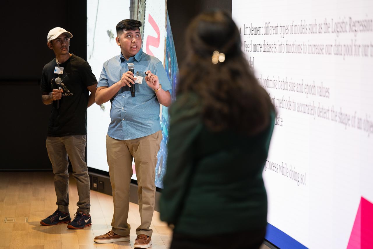 College students present their findings after a hackathon during Space Education Day, Tuesday, June 20, 2023, at the Microsoft Technology Center in Arlington, Va. Microsoft hosted the event to showcase the collaboration, early successes, and future plans for high quality student engagement through activities that combined space content and technologies like artificial intelligence and cloud computing. Photo Credit: (NASA/Aubrey Gemignani)