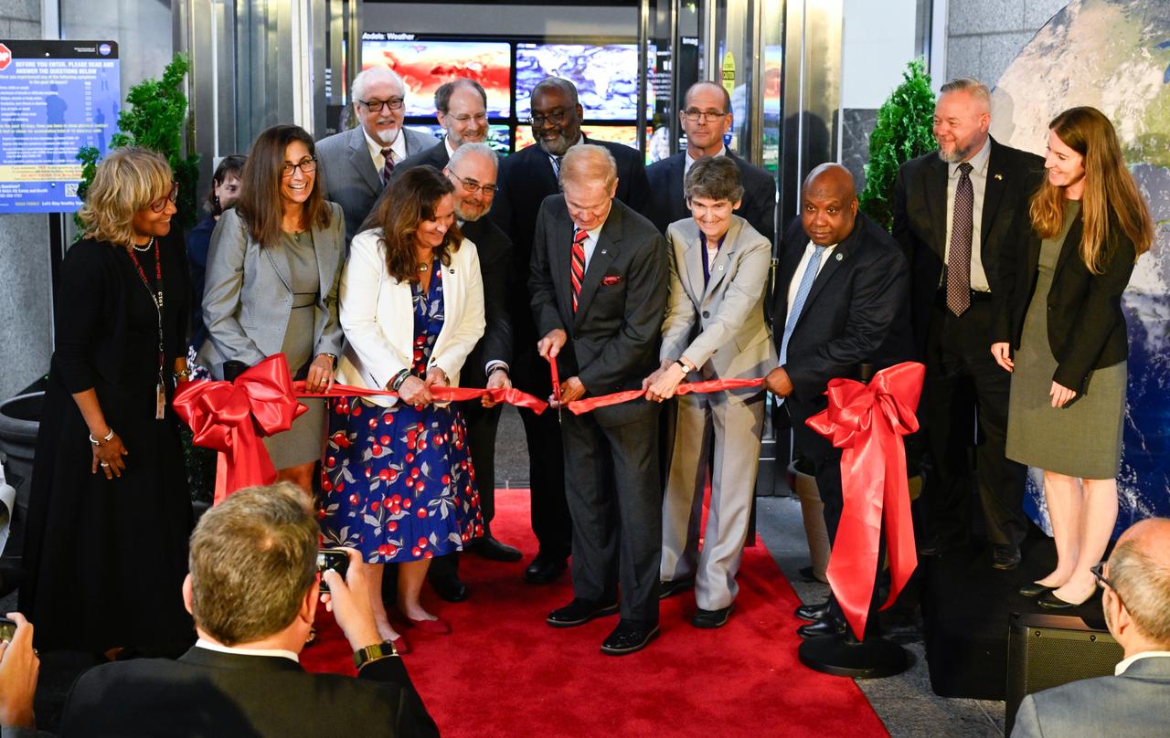NASA Administrator Bill Nelson, center, cuts the ribbon to open NASA’s Earth Information Center alongside agency leadership and leadership from NOAA, USGS, USDA, USAID, EPA, and FEMA, Wednesday, June 21, 2023, at the Mary W. Jackson NASA Headquarters building in Washington. The Earth Information Center is new immersive experience that combines live data sets with cutting-edge data visualization and storytelling to allow visitors to see how our planet is changing.  Photo Credit: (NASA/Joel Kowsky)