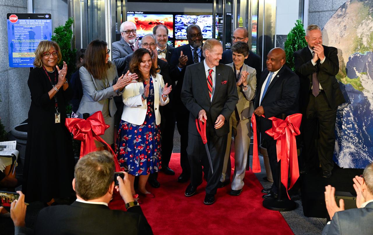 NASA Administrator Bill Nelson, center, cuts the ribbon to open NASA’s Earth Information Center alongside agency leadership and leadership from NOAA, USGS, USDA, USAID, EPA, and FEMA, Wednesday, June 21, 2023, at the Mary W. Jackson NASA Headquarters building in Washington. The Earth Information Center is new immersive experience that combines live data sets with cutting-edge data visualization and storytelling to allow visitors to see how our planet is changing.  Photo Credit: (NASA/Joel Kowsky)