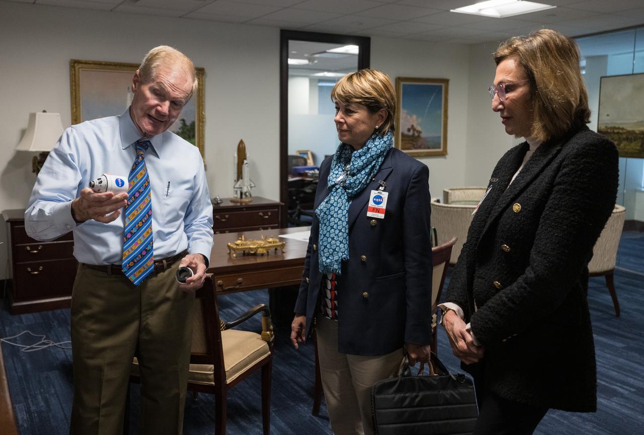 NASA Administrator Bill Nelson shows Monaco’s Minister of Foreign Affairs and Cooperation, Isabelle Berro-Amadeï, left, and  Ambassador of the Principality of Monaco to the United States and Canada, the Honorable Maguy Maccario Doyle, right, a model of the Space Launch System (SLS), Thursday, June 22, 2023 at the Mary W. Jackson NASA Headquarters building in Washington. Photo Credit: (NASA/Aubrey Gemignani)