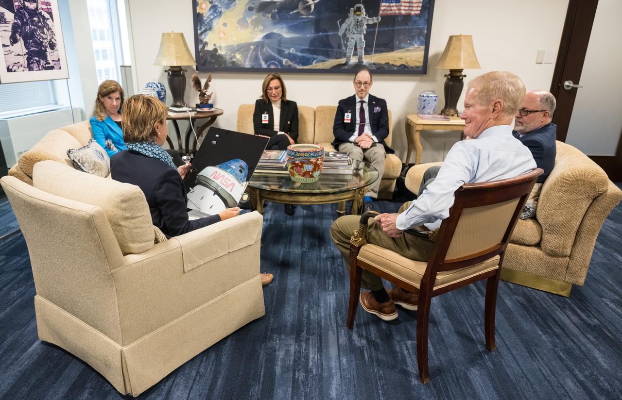 Monaco’s Minister of Foreign Affairs and Cooperation, Isabelle Berro-Amadeï views a photograph from the Artemis I mission during a meeting with, from left to right, NASA Associate Administrator for the Office of International and Interagency Relations, Karen Feldstein, Ambassador of the Principality of Monaco to the United States and Canada, the Honorable Maguy Maccario Doyle,  Deputy Chief of Mission, Embassy of the Principality of Monaco to the United States and Canada, the Honorable Jean-Philippe Bertani, NASA International Program Specialist with the Office of International and Interagency Relations, Anthony Tsougranis, and NASA Administrator Bill Nelson, Thursday, June 22, 2023 at the Mary W. Jackson NASA Headquarters building in Washington. Photo Credit: (NASA/Aubrey Gemignani)