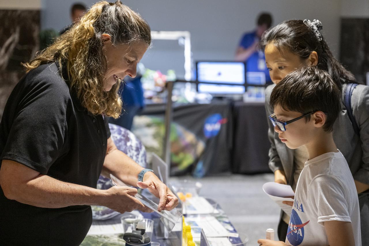 Local students participate in STEM activities prior to an Earth Information Center (EIC) student engagement event, Friday, June 23, 2023, at the Mary W. Jackson NASA Headquarters building in Washington. The EIC is a new immersive experience that combines live data sets with cutting-edge data visualization and storytelling to allow visitors to see how our planet is changing. Photo Credit: (NASA/Keegan Barber)