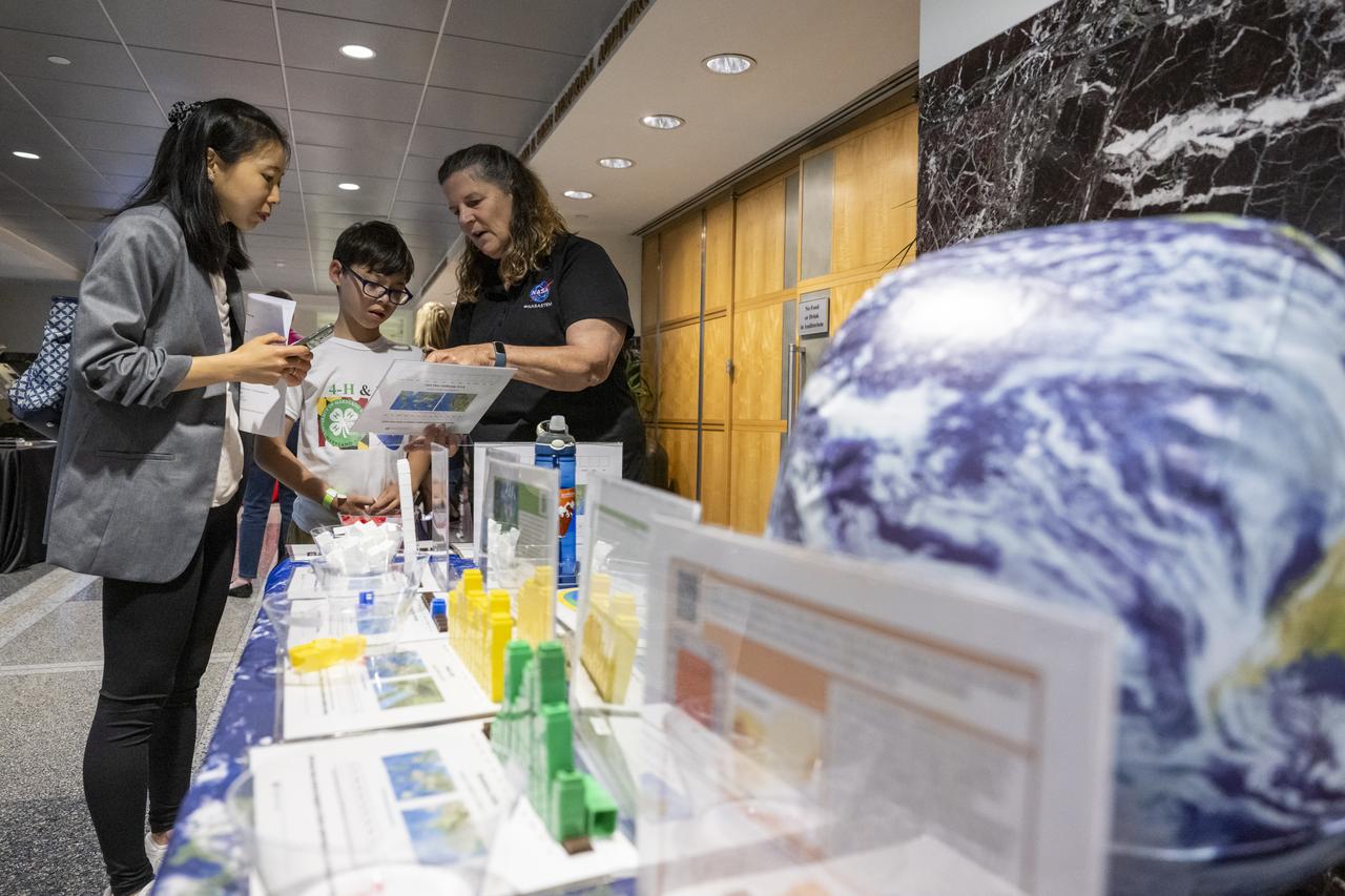 Local students participate in STEM activities prior to an Earth Information Center (EIC) student engagement event, Friday, June 23, 2023, at the Mary W. Jackson NASA Headquarters building in Washington. The EIC is a new immersive experience that combines live data sets with cutting-edge data visualization and storytelling to allow visitors to see how our planet is changing. Photo Credit: (NASA/Keegan Barber)
