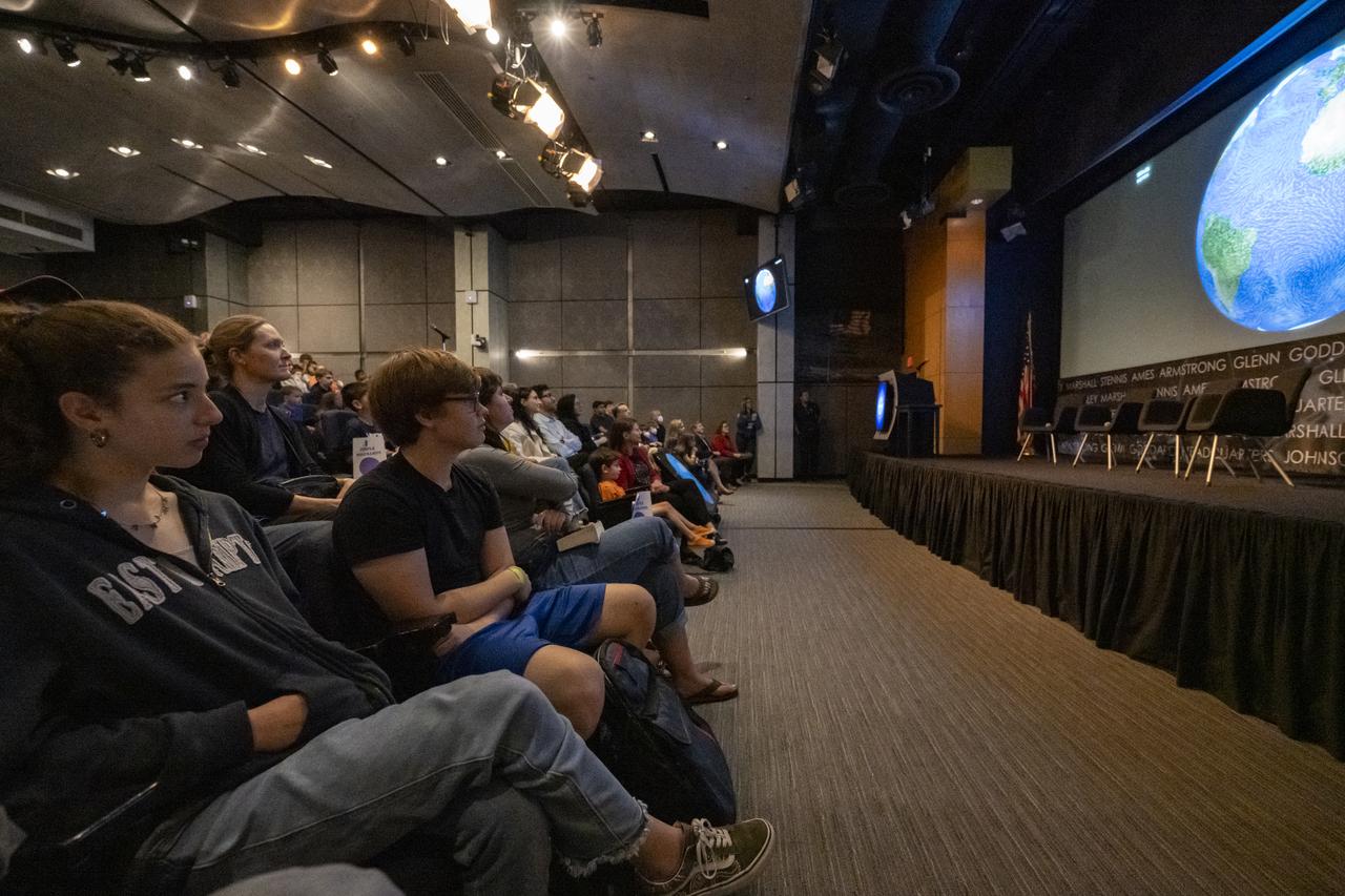 Local students view a video presentation during an Earth Information Center (EIC) student engagement event, Friday, June 23, 2023, at the Mary W. Jackson NASA Headquarters building in Washington. The EIC is a new immersive experience that combines live data sets with cutting-edge data visualization and storytelling to allow visitors to see how our planet is changing. Photo Credit: (NASA/Keegan Barber)