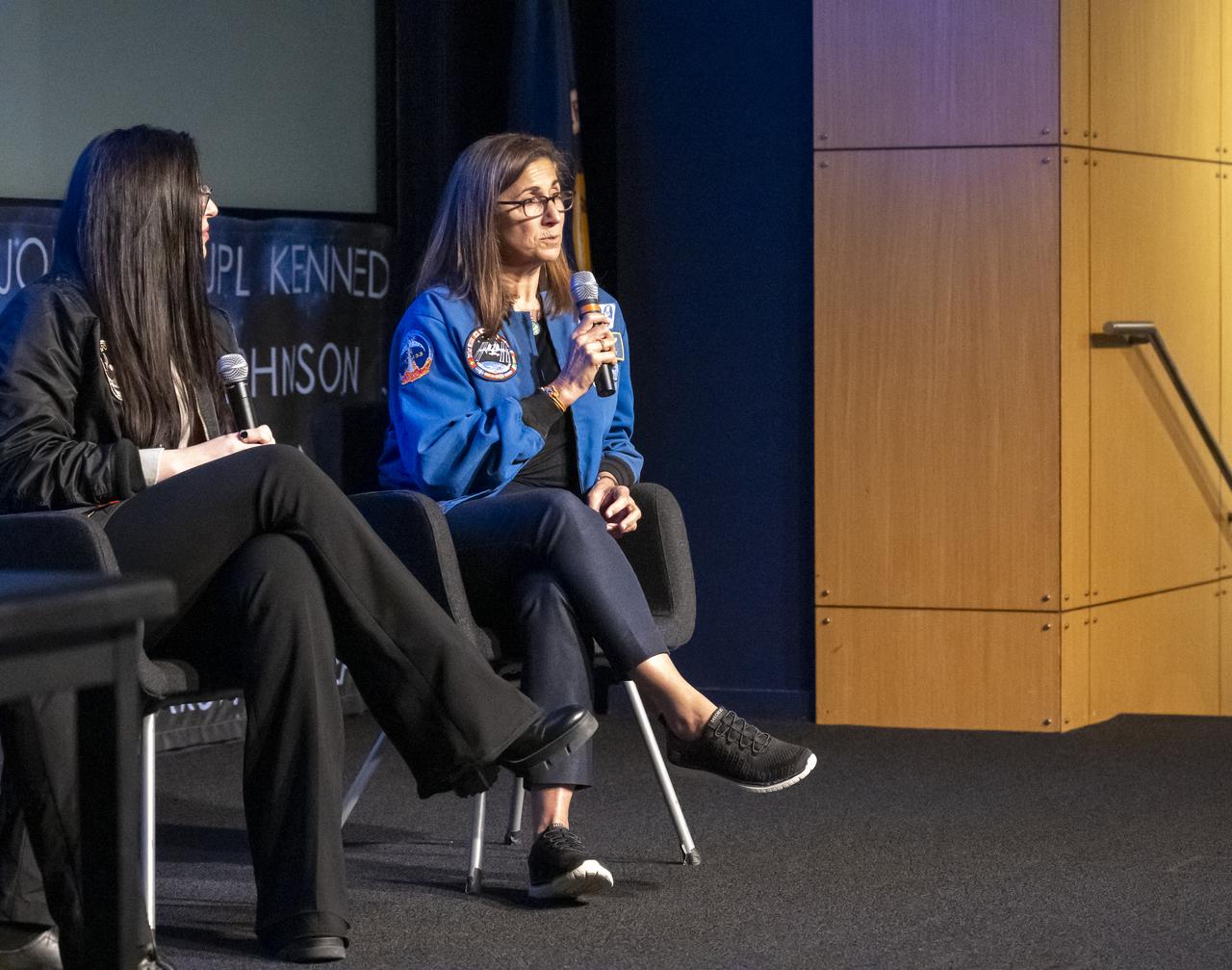 Former NASA Astronaut Nicole Stott, right, delivers remarks during an Earth Information Center (EIC) student engagement event, Friday, June 23, 2023, at the Mary W. Jackson NASA Headquarters building in Washington. The EIC is a new immersive experience that combines live data sets with cutting-edge data visualization and storytelling to allow visitors to see how our planet is changing. Photo Credit: (NASA/Keegan Barber)