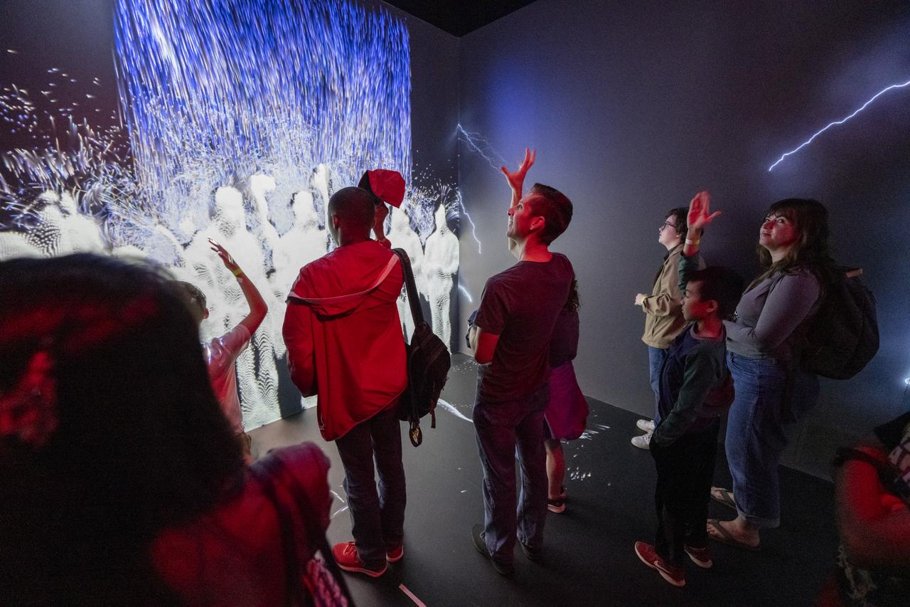 Local students participate in an Earth Information Center (EIC) student engagement event, Friday, June 23, 2023, at the Mary W. Jackson NASA Headquarters building in Washington. The EIC is a new immersive experience that combines live data sets with cutting-edge data visualization and storytelling to allow visitors to see how our planet is changing. Photo Credit: (NASA/Keegan Barber)