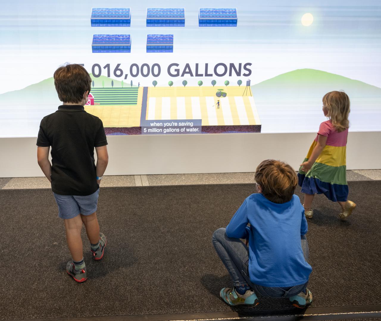 Local students participate in an Earth Information Center (EIC) student engagement event, Friday, June 23, 2023, at the Mary W. Jackson NASA Headquarters building in Washington. The EIC is a new immersive experience that combines live data sets with cutting-edge data visualization and storytelling to allow visitors to see how our planet is changing. Photo Credit: (NASA/Keegan Barber)