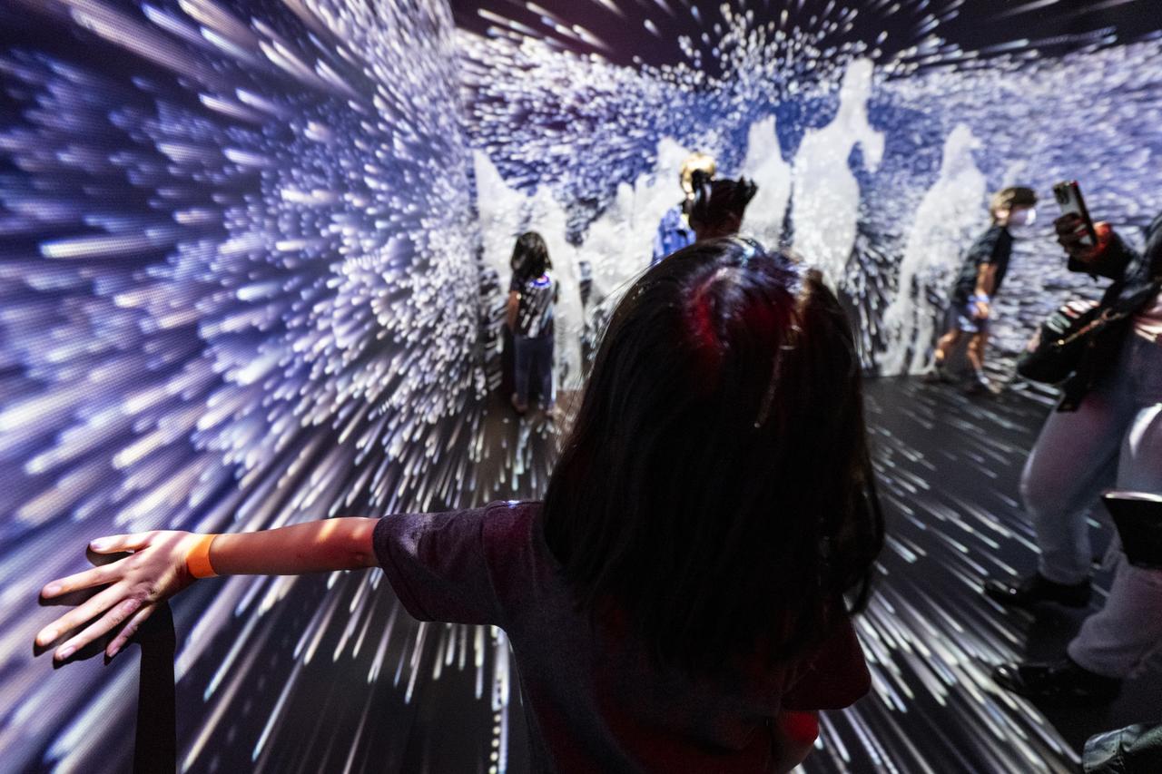 Local students participate in an Earth Information Center (EIC) student engagement event, Friday, June 23, 2023, at the Mary W. Jackson NASA Headquarters building in Washington. The EIC is a new immersive experience that combines live data sets with cutting-edge data visualization and storytelling to allow visitors to see how our planet is changing. Photo Credit: (NASA/Keegan Barber)