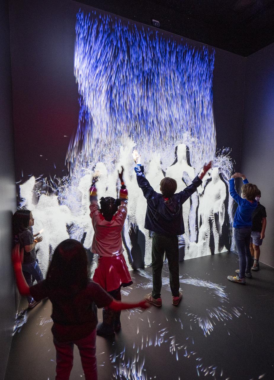Local students participate in an Earth Information Center (EIC) student engagement event, Friday, June 23, 2023, at the Mary W. Jackson NASA Headquarters building in Washington. The EIC is a new immersive experience that combines live data sets with cutting-edge data visualization and storytelling to allow visitors to see how our planet is changing. Photo Credit: (NASA/Keegan Barber)