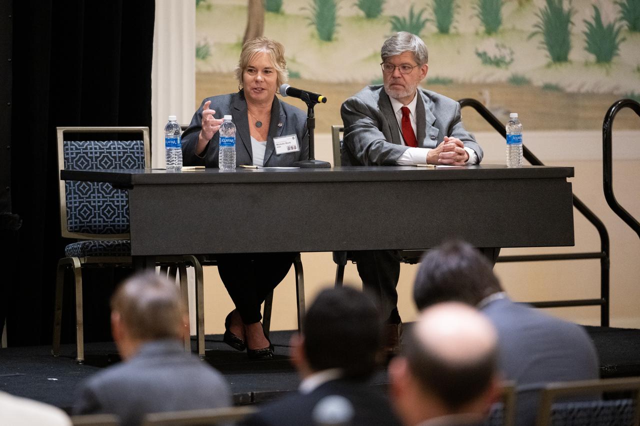 Michelle Munk, chief architect for NASA’s Space Technology Mission Directorate, left, answers a question alongside Joel Kearns, deputy associate administrator for Exploration in NASA's Science Mission Directorate, during NASA’s Moon to Mars Architecture Workshop, Tuesday, June 27, 2023, at the Gaylord National Resort and Convention Center in National Harbor, Md. Following the release of the 2022 Architecture Concept Review, NASA is conducting the workshop to engage the broader space community and collect feedback from U.S. industry and academia to inform the Moon to Mars mission architecture and operational delivery. Photo Credit: (NASA/Joel Kowsky)