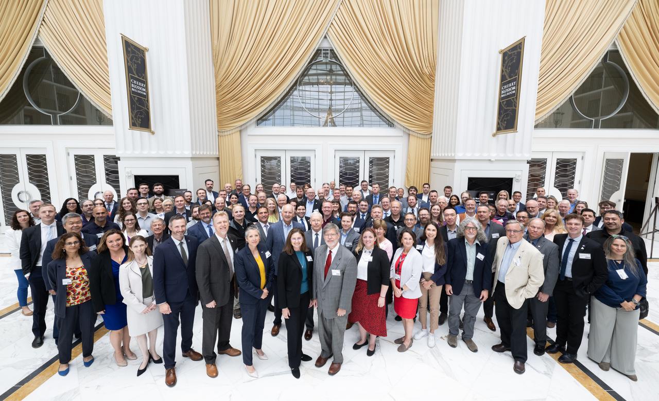 Attendees of NASA’s Moon to Mars Architecture Workshop pose for a group picture, Tuesday, June 27, 2023, at the Gaylord National Resort and Convention Center in National Harbor, Md. Following the release of the 2022 Architecture Concept Review, NASA is conducting the workshop to engage the broader space community and collect feedback from U.S. industry and academia to inform the Moon to Mars mission architecture and operational delivery. Photo Credit: (NASA/Joel Kowsky)